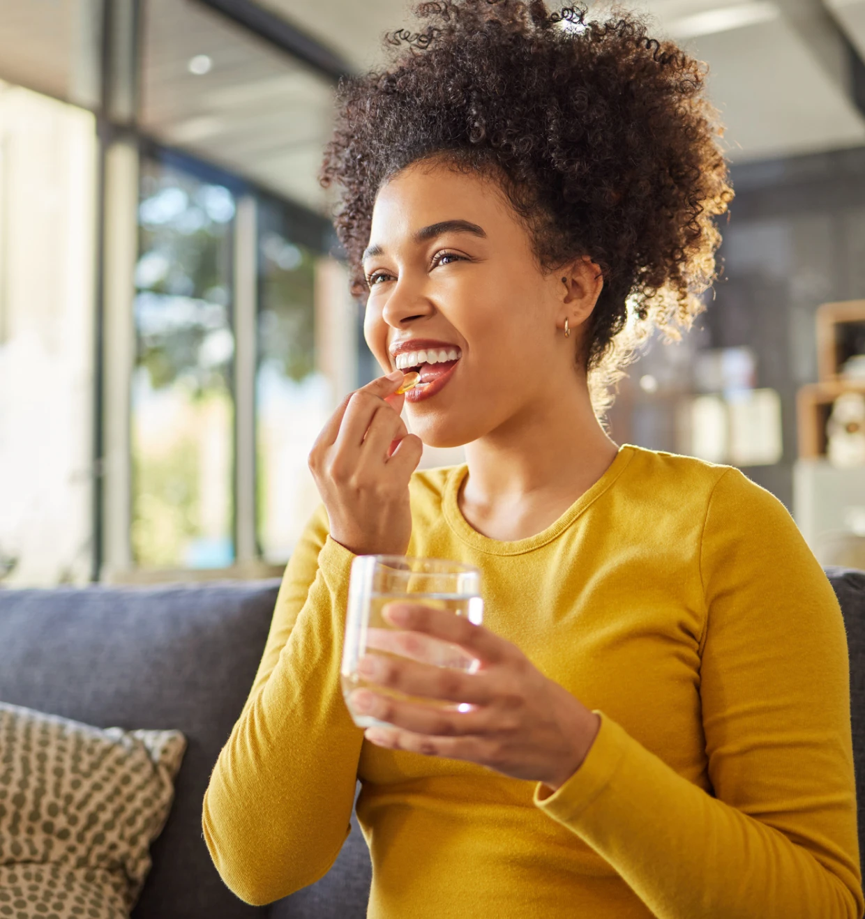 Smiling woman with snack and drink
